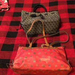 A pair of Dooney and Bourke purses